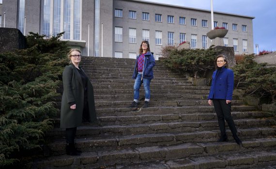 Authors Kristín Svava Tómasdóttir, Erla Hulda Halldórsdóttir, Ragnheiður Kristjánsdóttir at a big stair..